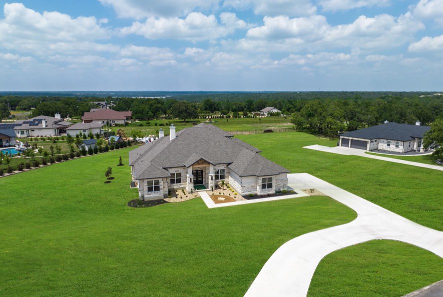 Chance Leigh custom Hill Country estate with beautiful native limestone facades
