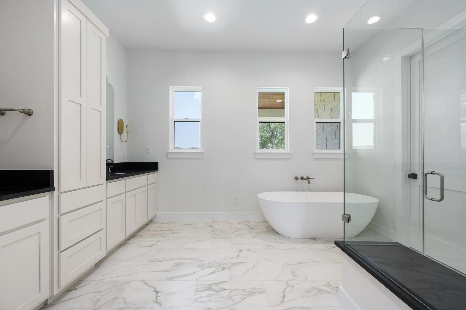 Custom bathroom with tile work and premium fixtures